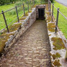 Railed Enclosure Beside Road, Opposite North-East Corner Of Estate Offices