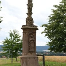 Wayside cross in front of the golf course