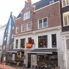 Dwarshuis waarop middentop onder rollagen