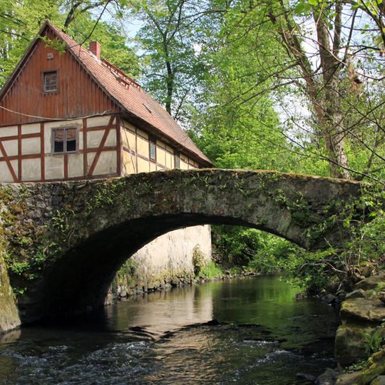 Quarry stone arch bridge over the river Röder Liegau-Augustusbad