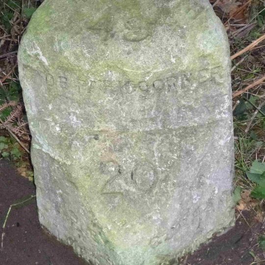 Milestone, Wisley Common near RHS Gardens, NE of footbridge, S bound carriageway