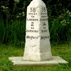 Milestone, Rodbridge Corner, N of jct and bus shelter
