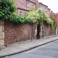 Wall, gate and gate piers approximately 7 metres north east of numbers 40-42 Aldwark (not included)