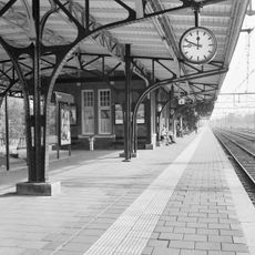 Station platform with buildings Weert
