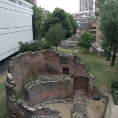 London Wall: section of Roman and medieval wall and bastions, west and north of Monkwell Square