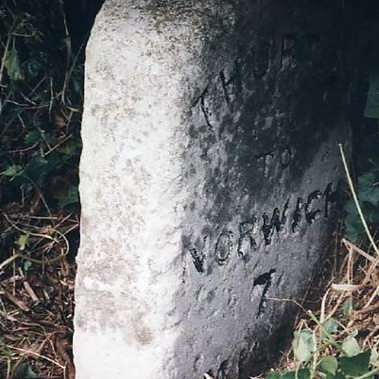 Milestone, 55yds E of end of cul-de-sac