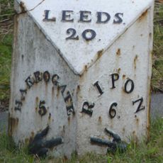 Milepost At Corner Of Green Lane