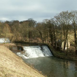 Overflow to Lower Lake, 3 weirs to east side of dam and pump house adjacent to Middle Weir in Bretton Park
