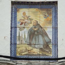 Ceramic panel of Saint Paschal Baylón at 19 Sant Miquel street