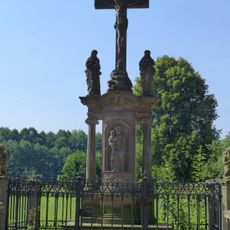 Sculpture of the Crucifixion with statues of St. John the Baptist and St. Barbora in Křinice