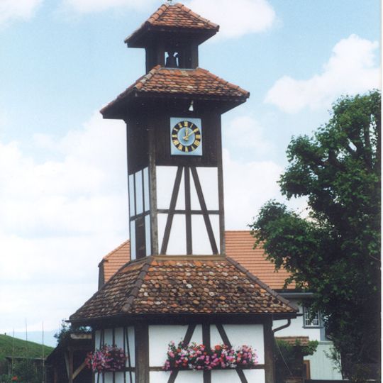 Little clock tower and farmhouse Buri