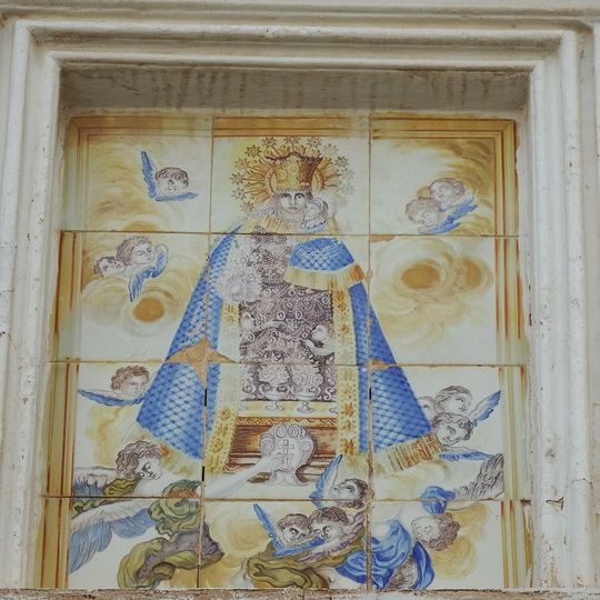 Ceramic panel of Our Lady of the Forsaken at 7 Carnisseria street, Benimàmet