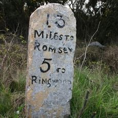 Milestone 200m north east of Handy Cross