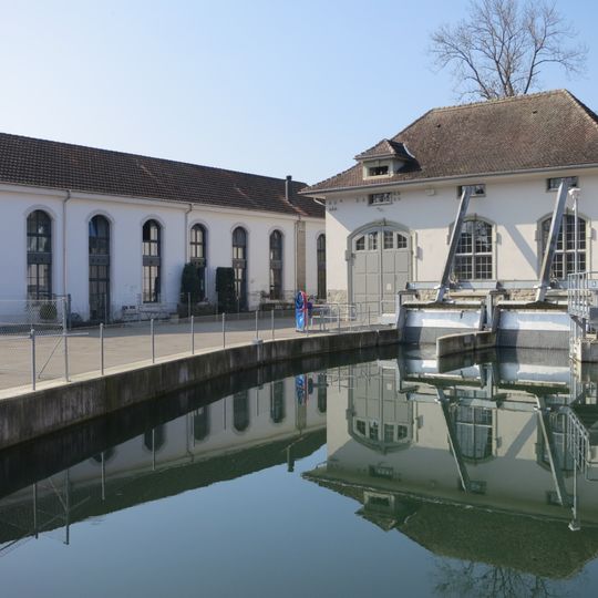 Former spinning and weaving mill with turbine houses and cost houses