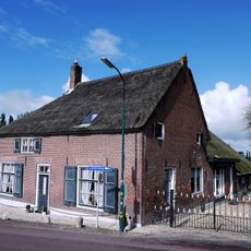 Boerderij met fraai rieten dak