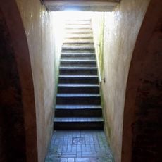 Wall With Entrance To Underground Ice House In Back Garden Of Number 43 And Running Underneath Manor House Gardens