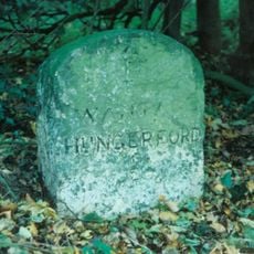 Milestone 100 Metres South Of Entrance To Folly Farm