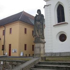 Socha svatého Metoděje u schodiště do kostela Narození Panny Marie v Želivi