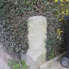 Milestone, Newton Road, by "Caton" bungalow, 50m from bus stop; on opp. side of road