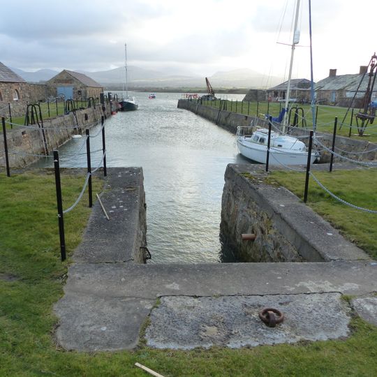 Dock, perimeter wall and attached buildings to east of Fort Belan