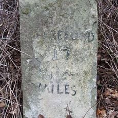 Milestone, 150m E of toll bridge