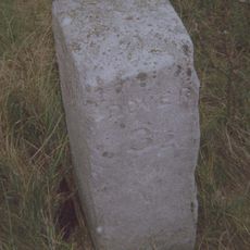 Milepost, E of roundabout intersection with A2, W of footpath to Hougham Court Farm
