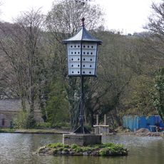 The Chinese Dovecot on island in lake to premises occupied by English Calico Limited
