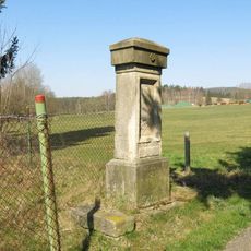 Kříž na západním okraji Rynoltic poblíž domu čp. 80