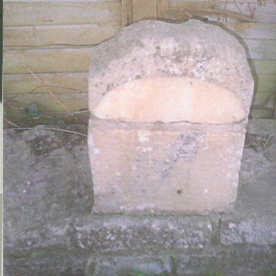 Milestone, N of village pub