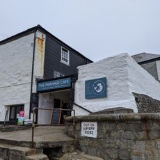 The Mermaid Cafe And Adjoining House To North