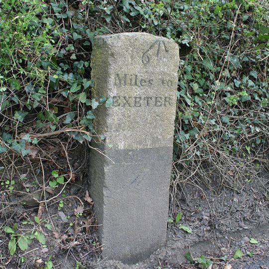 Milestone, Six Mile Hill, by "Hazelbank", 150m W of Two Crosses