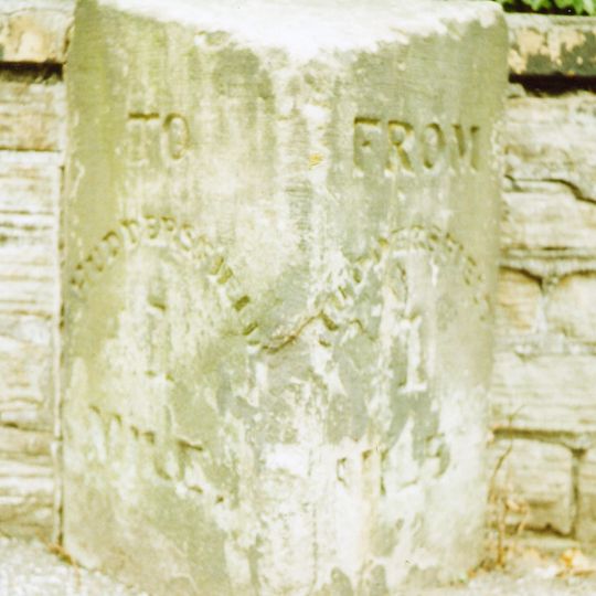 Milestone, Bradford Road, Fartown, outside No. 246 , nr Olive Street. Opp Dreamers Store