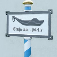 Gusseisernes Schild „Einhemmstelle“