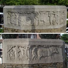 Reliëfs met dieren en spreuken