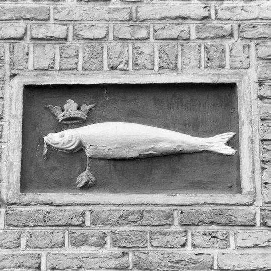 Huis met gepleisterde lijstgevel