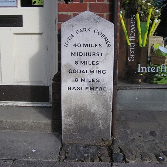 Milestone, Town centre beside flower shop