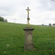 Kříž u silnice na západním okraji Merboltic