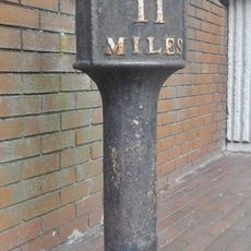 Milepost, by side of No. 65 Green Lane, nr Gower Street jct