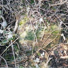 Milestone, SW of village, just N of road jct
