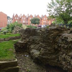 Roman wall, ditch and gate adjoining and under The Park