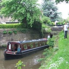 Marple Locks Number 10 and adjoining footbridge on Peak Forest Canal