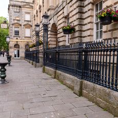 Attached basement area railings to The Exchange