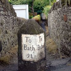 Milestone Between Numbers 124 And 126 (Numbers 124 And 126 Not Included)