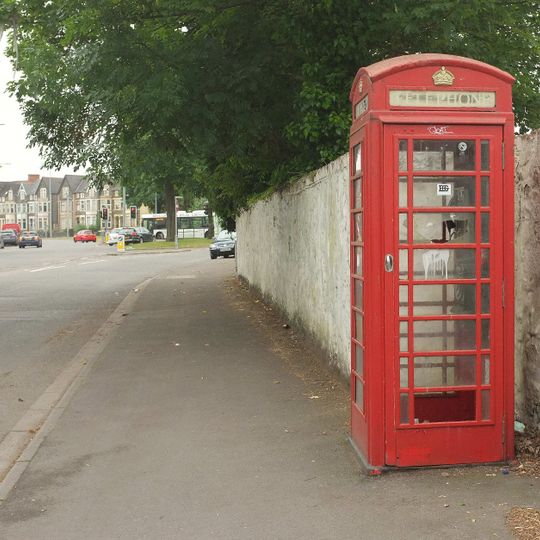 Telephone call box adjoining boundary wall of Roath Court