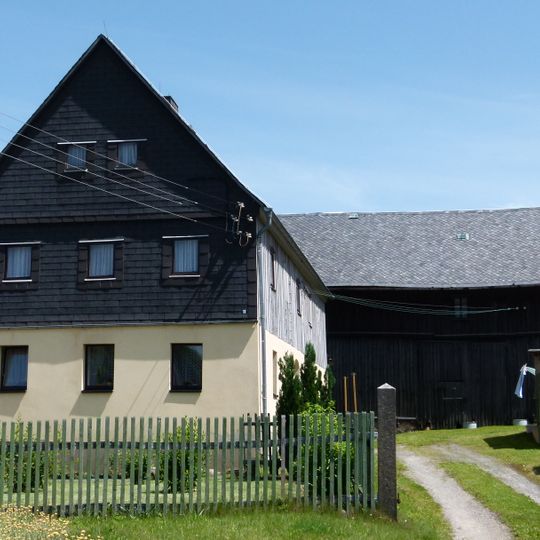 Wohnstallhaus und Scheune eines Zweiseithofes Alte Belmsdorfer Straße 11