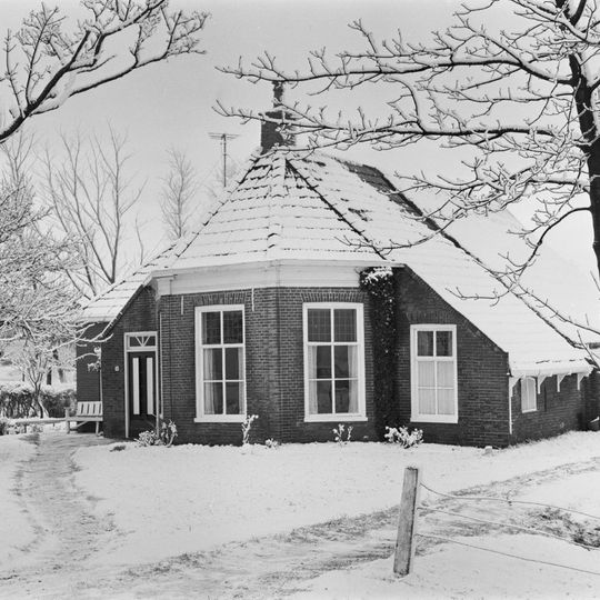 Woning met aangebouwde schuur