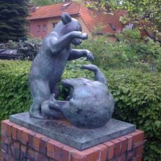 Two bear cubs playing