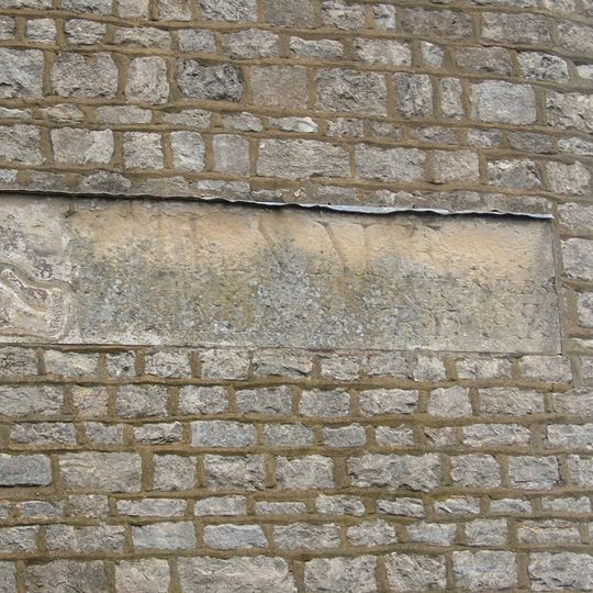 Milestone, North Street; set in wall of No. 45, on corner with Moor End Lane