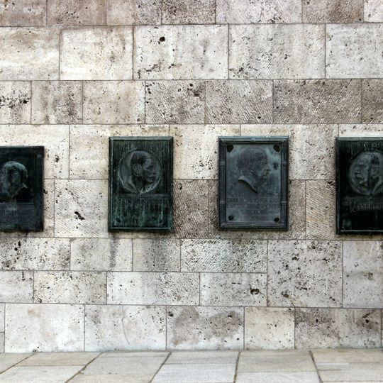 7 bronze plaques with portrait reliefs