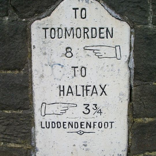 Milepost Set In Wall Opposite United Reformed Church